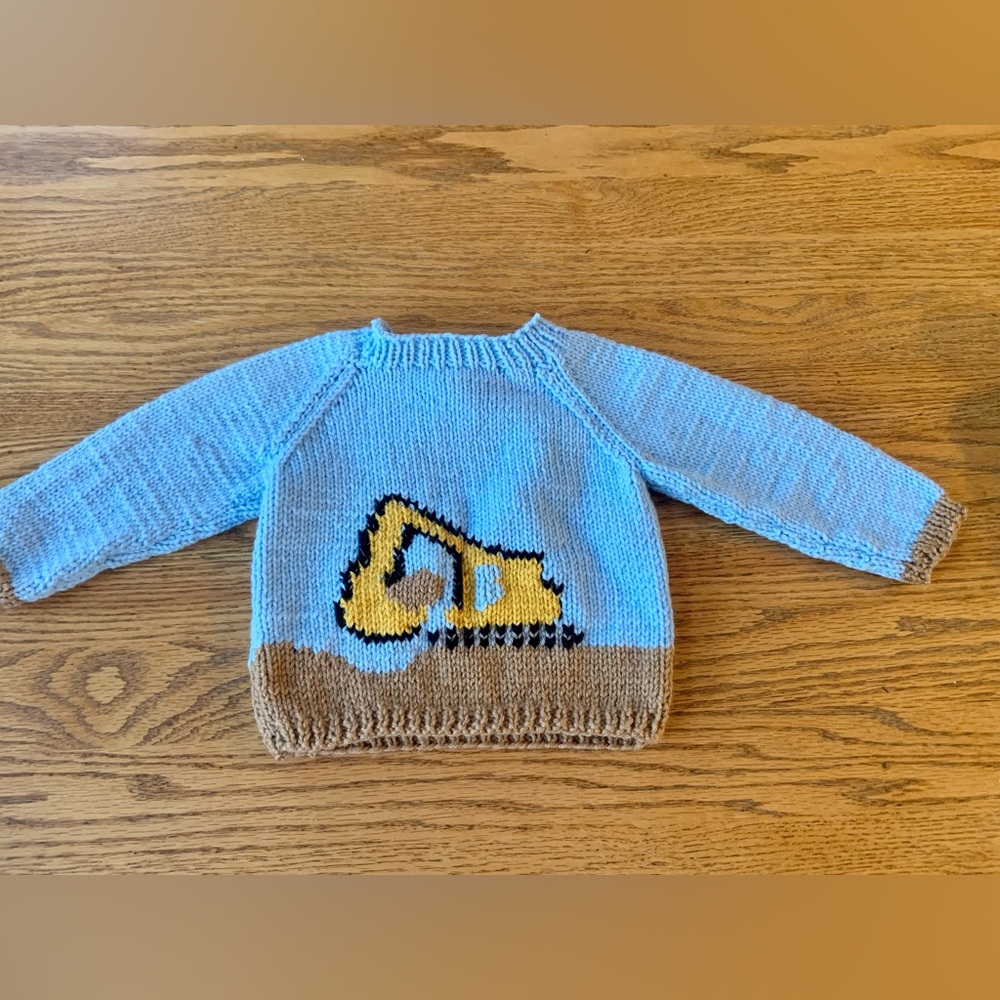 New Hand-knit Baby Sweater with Excavator